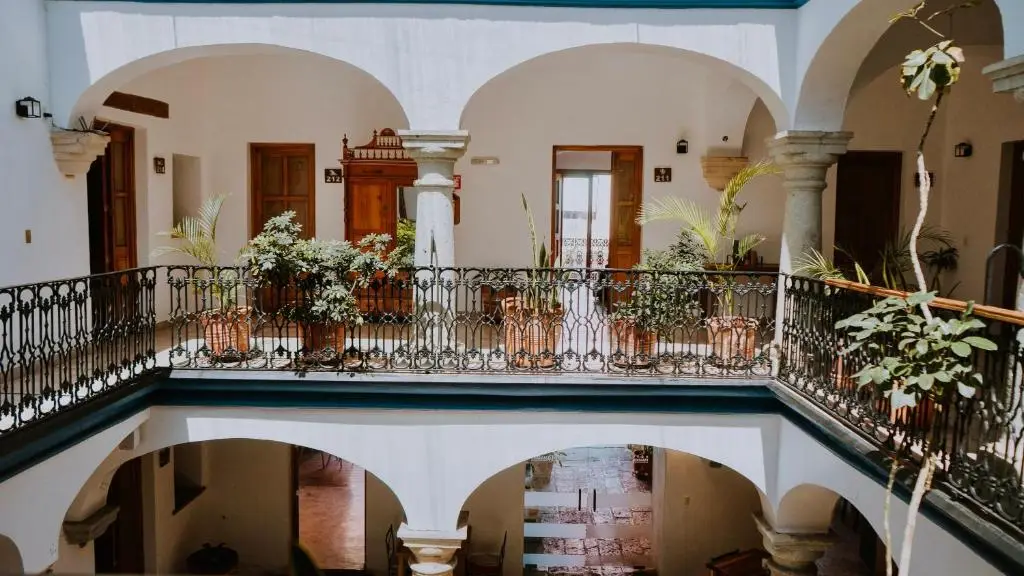 Colonial arches and balcony at Parador San Agustin